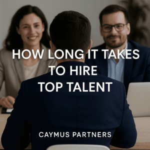Interview setting with candidate and two interviewers, used for article on hiring timelines by Caymus Partners